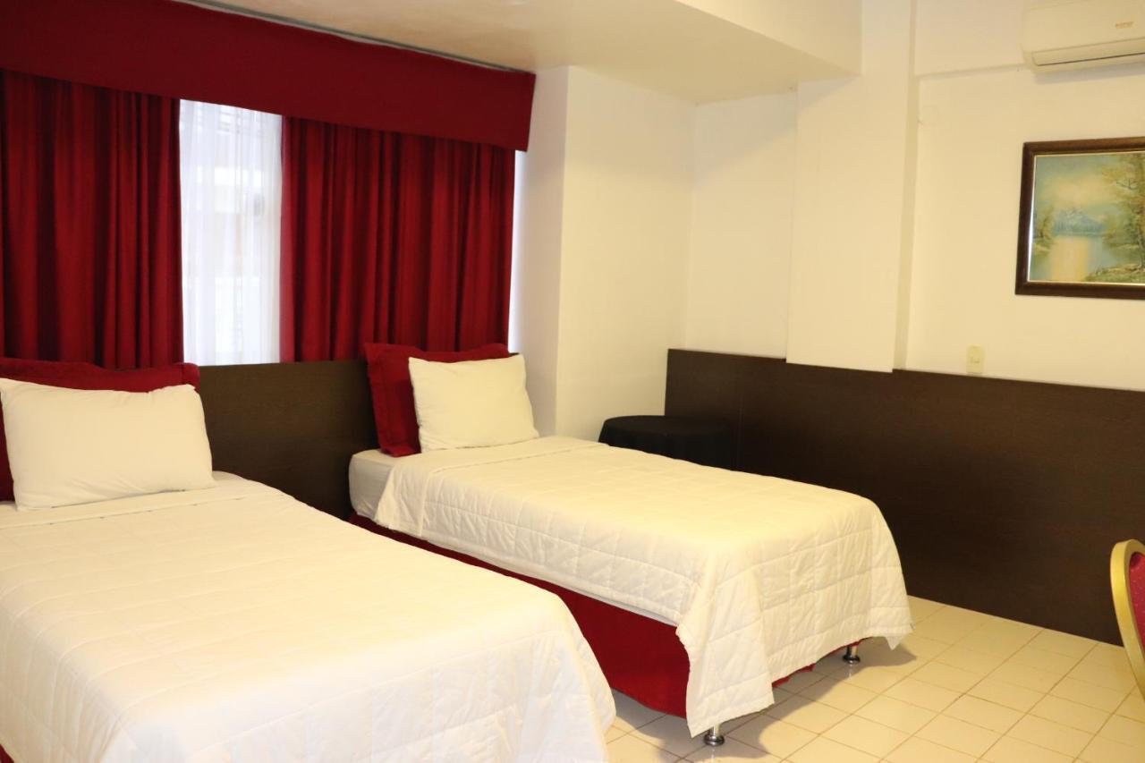Luxsur Hotel Encarnación Quarto foto